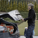 kevin bacon opening car trunk.
